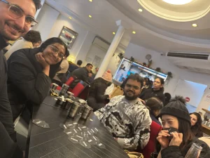 Group of friends smiling while playing bees